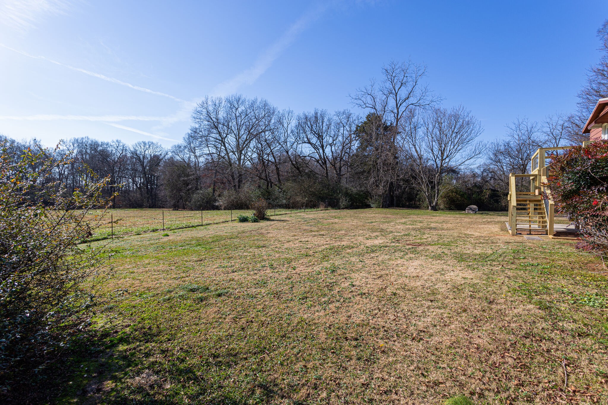 404 Monroe Floyd Road Decherd, TN 37324 - Photo 39 of 44 a view of a yard with a house in the background