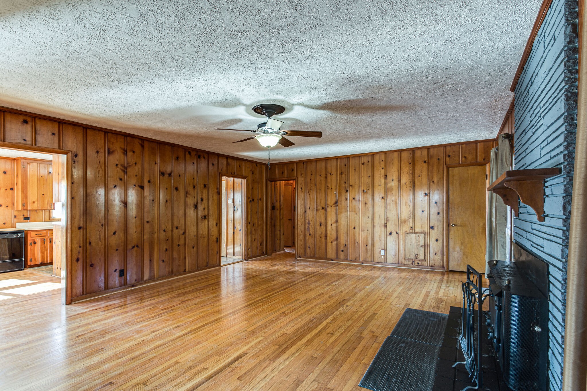 404 Monroe Floyd Road Decherd, TN 37324 - Photo 9 of 44 wooden floor in an empty room with a window