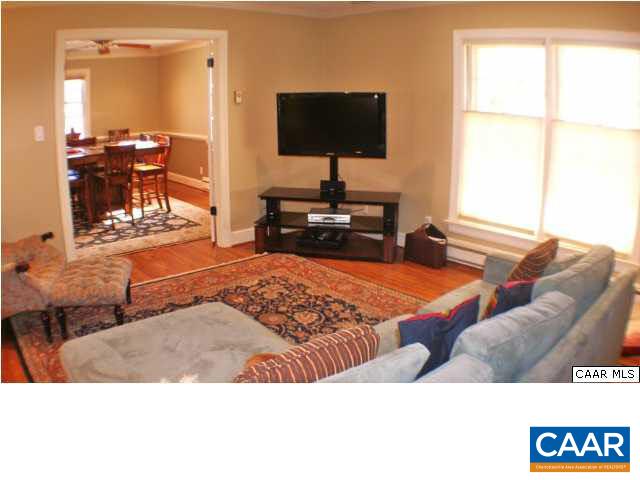 1724 Old Forge Road Charlottesville, VA 22901 - Photo 29 of 30 a living room with furniture and a flat screen tv