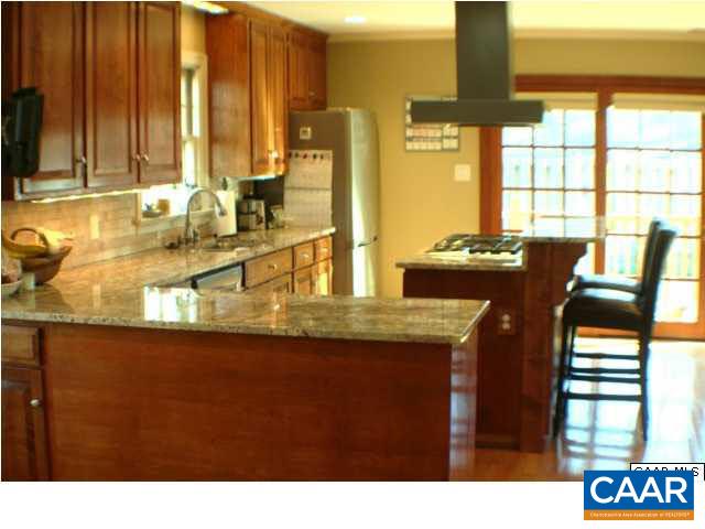 1724 Old Forge Road Charlottesville, VA 22901 - Photo 5 of 30 a kitchen with granite countertop a sink and a cabinets