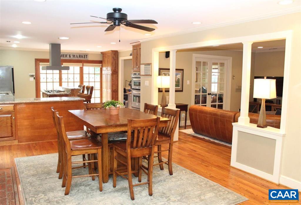 1724 Old Forge Road Charlottesville, VA 22901 - Photo 9 of 30 a dining room with furniture a rug and chandelier