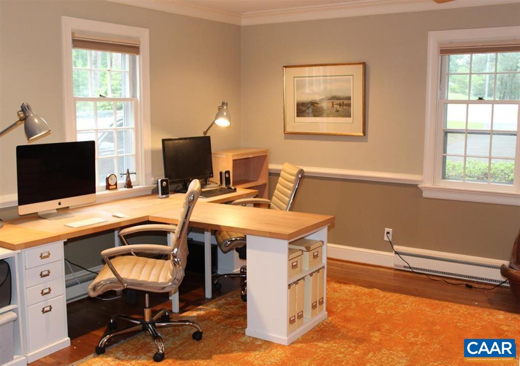 1724 Old Forge Road Charlottesville, VA 22901 - Photo 10 of 30 a view of a workspace with furniture and a window
