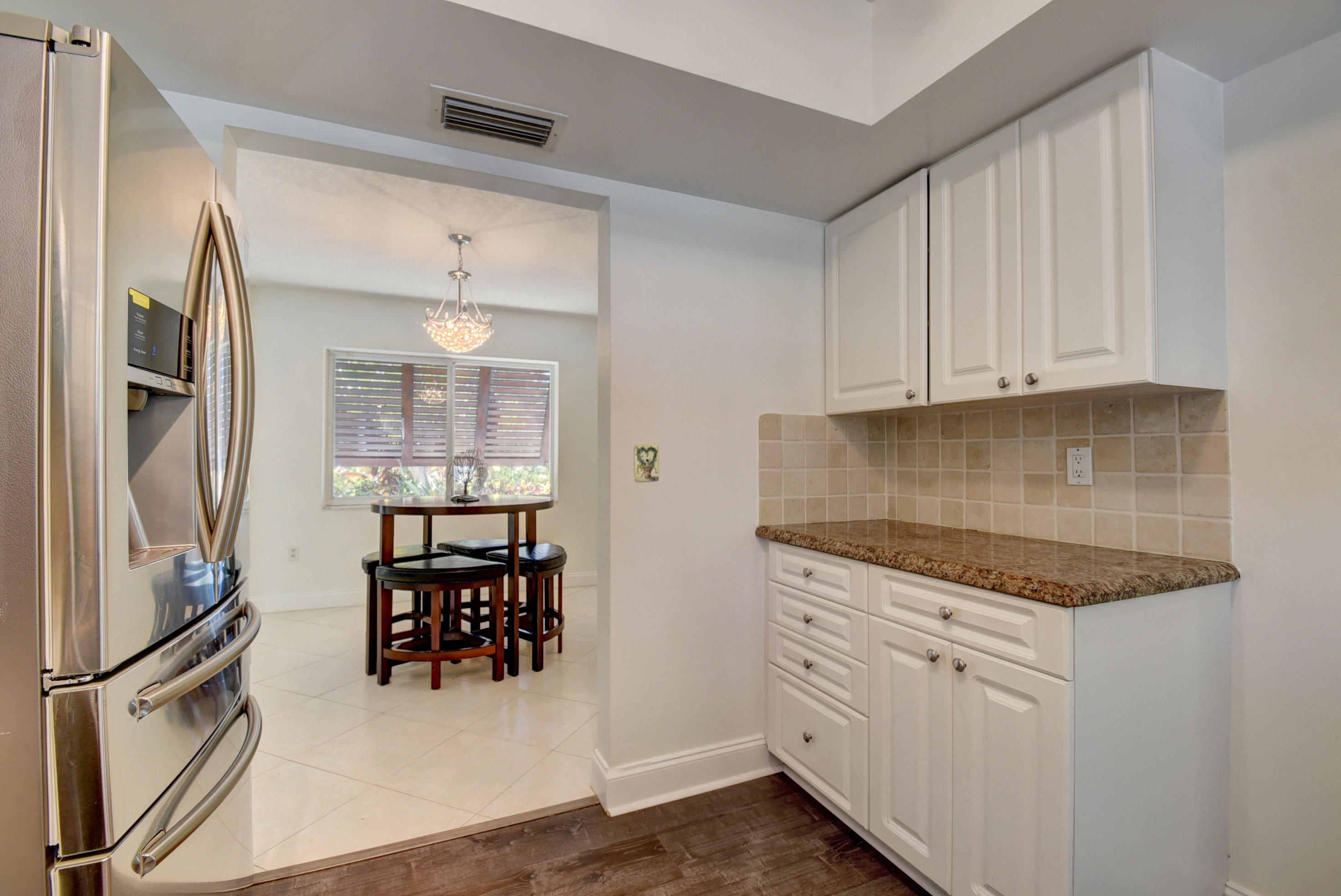 869 Periwinkle Street Boca Raton, FL 33486 - Photo 11 of 31 Kitchen & Dining