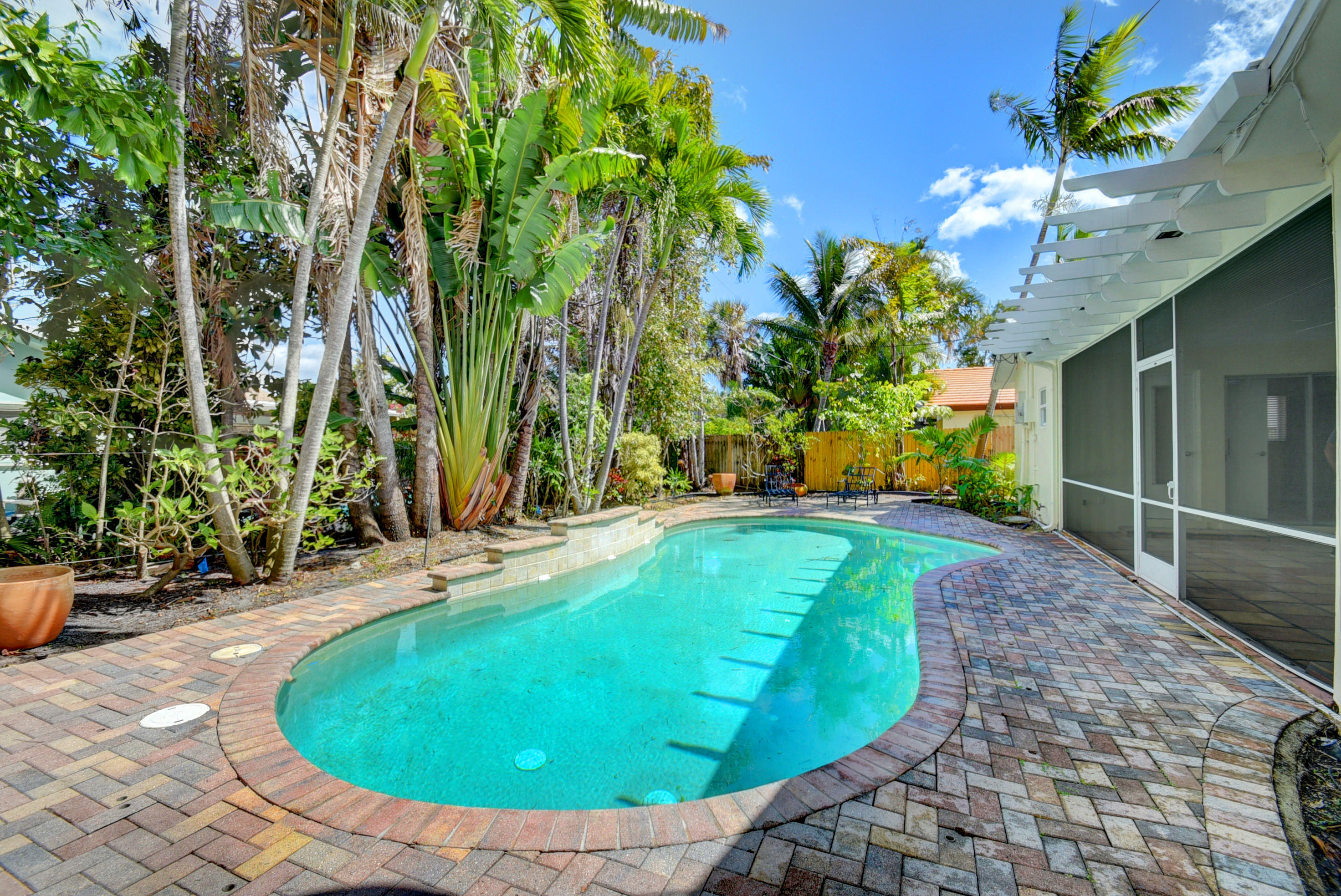 869 Periwinkle Street Boca Raton, FL 33486 - Photo 23 of 31 Pool angle 1