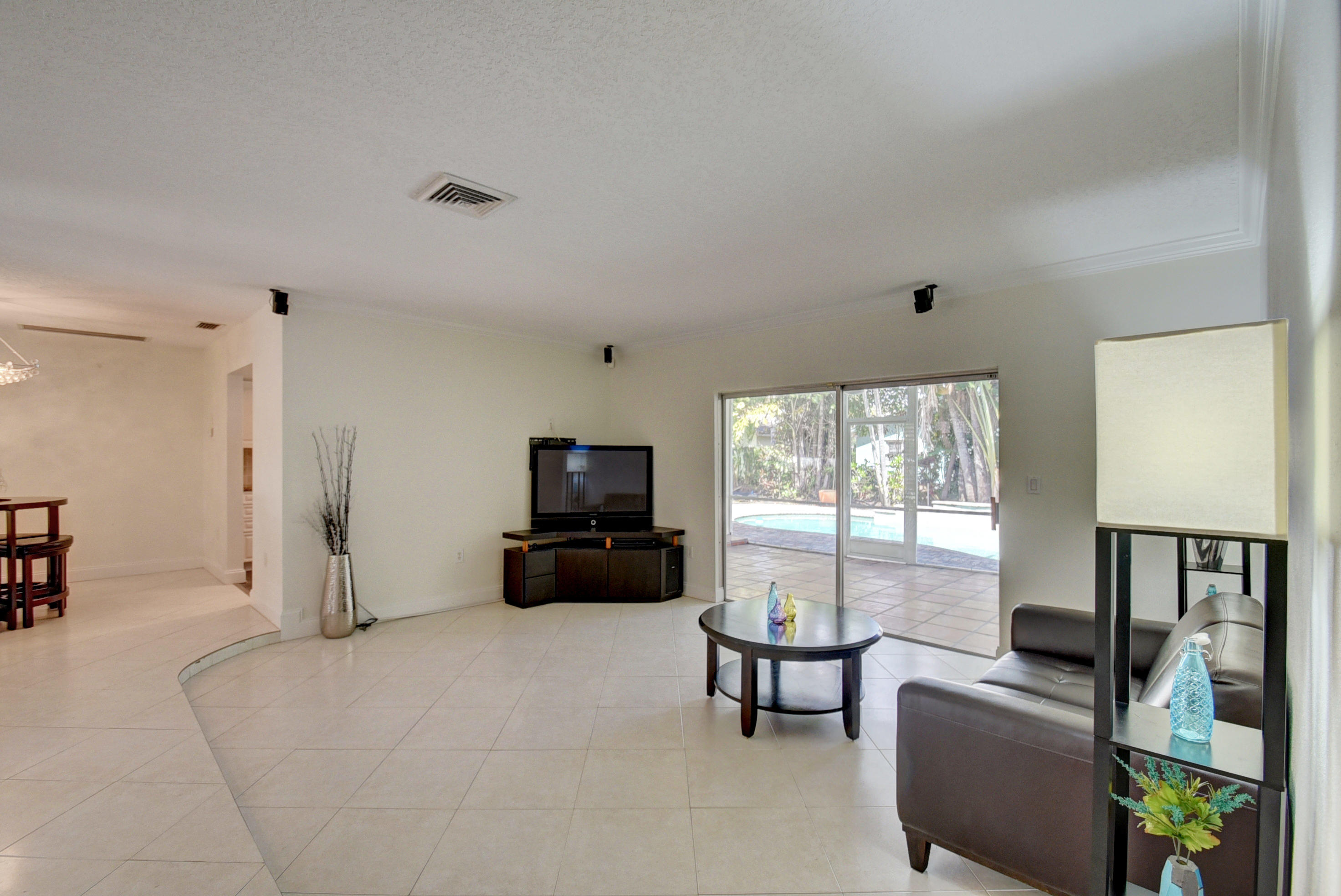 869 Periwinkle Street Boca Raton, FL 33486 - Photo 5 of 31 Living Room angle 3