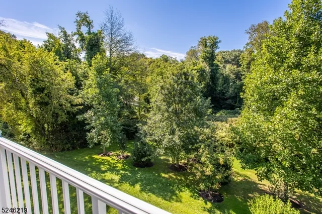 a view of a garden from a balcony