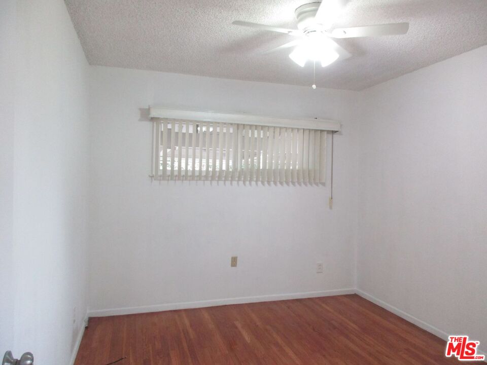 719 East 154th Street Compton, CA 90220 - Photo 24 of 32 wooden floor in an empty room