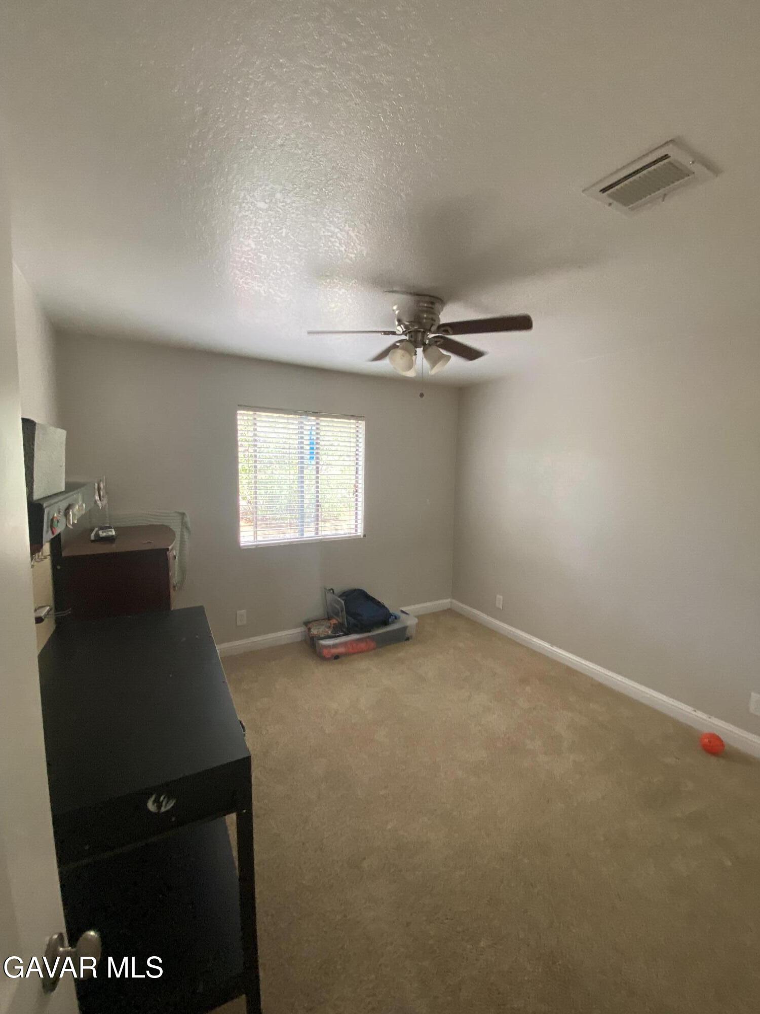 20909 Ridgeway Drive Tehachapi, CA 93561 - Photo 10 of 13 a view of a workspace with furniture