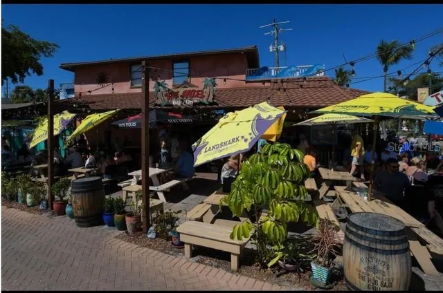 a view of a chairs and tables in patio