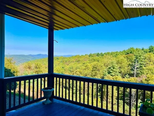 a view of roof with wooden floor