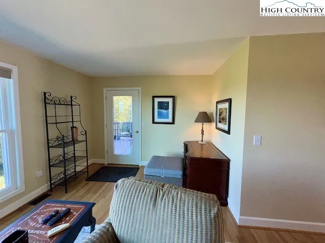 a bedroom with furniture and a window