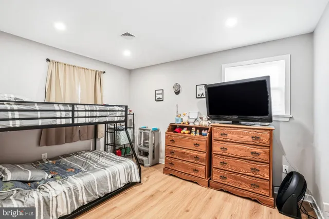 a hallway with sliding door and entryway