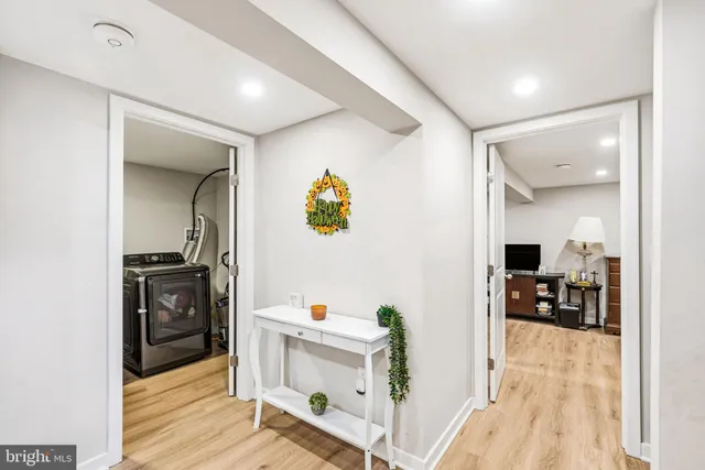 a room with furniture and a wooden floor