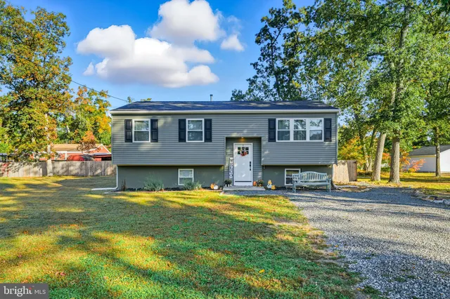 a house view with a garden space