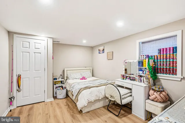 a view of a dining room with furniture and a kitchen