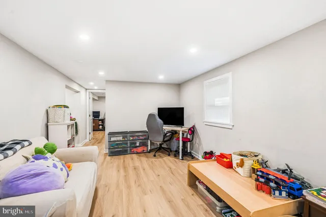 a view of a backyard with a tree