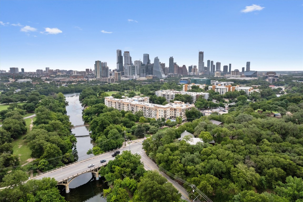 1900 Barton Springs Road, Unit 2027 Austin, TX 78704 - Photo 26 of 28 Bird's eye view of city skyline, a large body of water, and a notable bridge