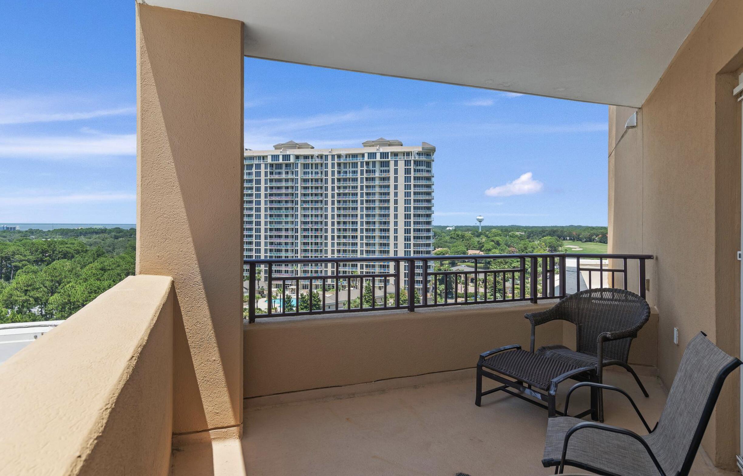 4789 Westwinds Drive, Unit 4789 Miramar Beach, FL 32550 - Photo 12 of 32 a view of balcony with a couch