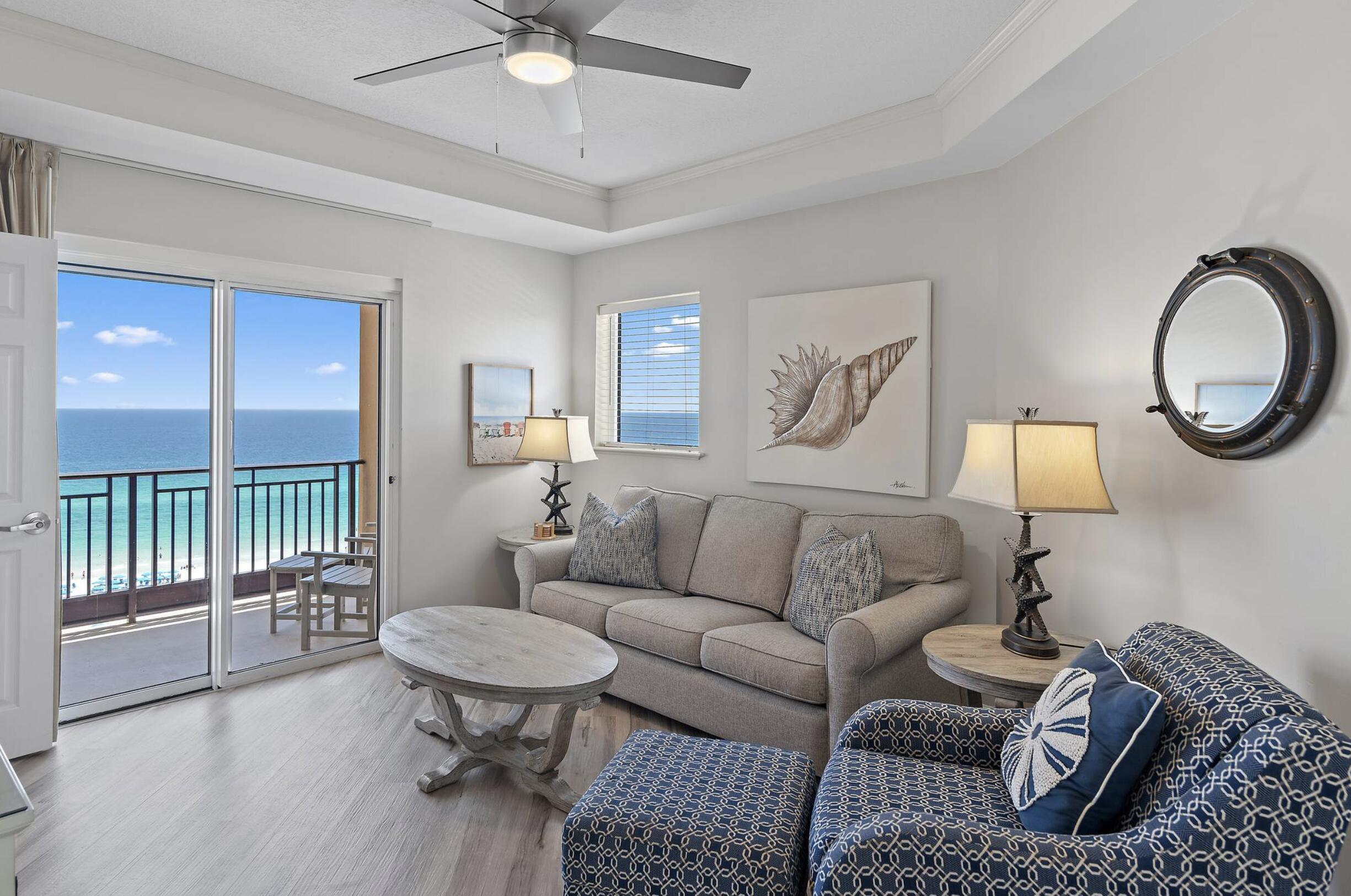 4789 Westwinds Drive, Unit 4789 Miramar Beach, FL 32550 - Photo 2 of 32 a living room with furniture and a lamp