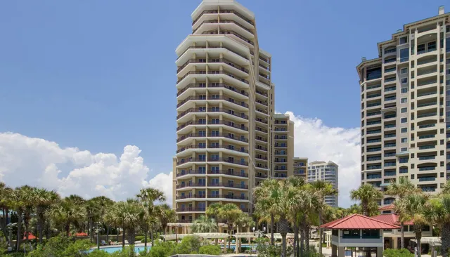 a view of swimming pool with outdoor seating and deck