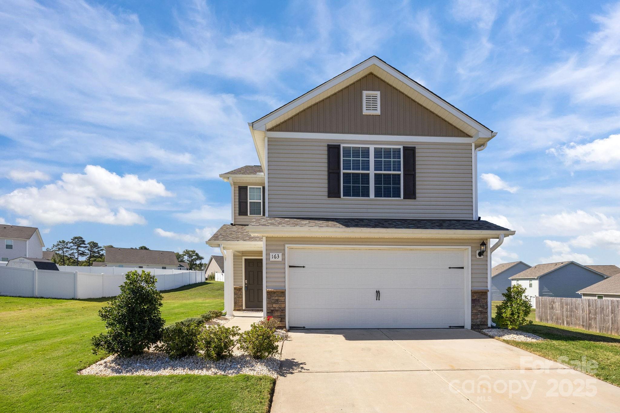 163 Kipling Lane Kings Mountain, NC 28086 - Photo 1 of 46 a front view of a house with a yard