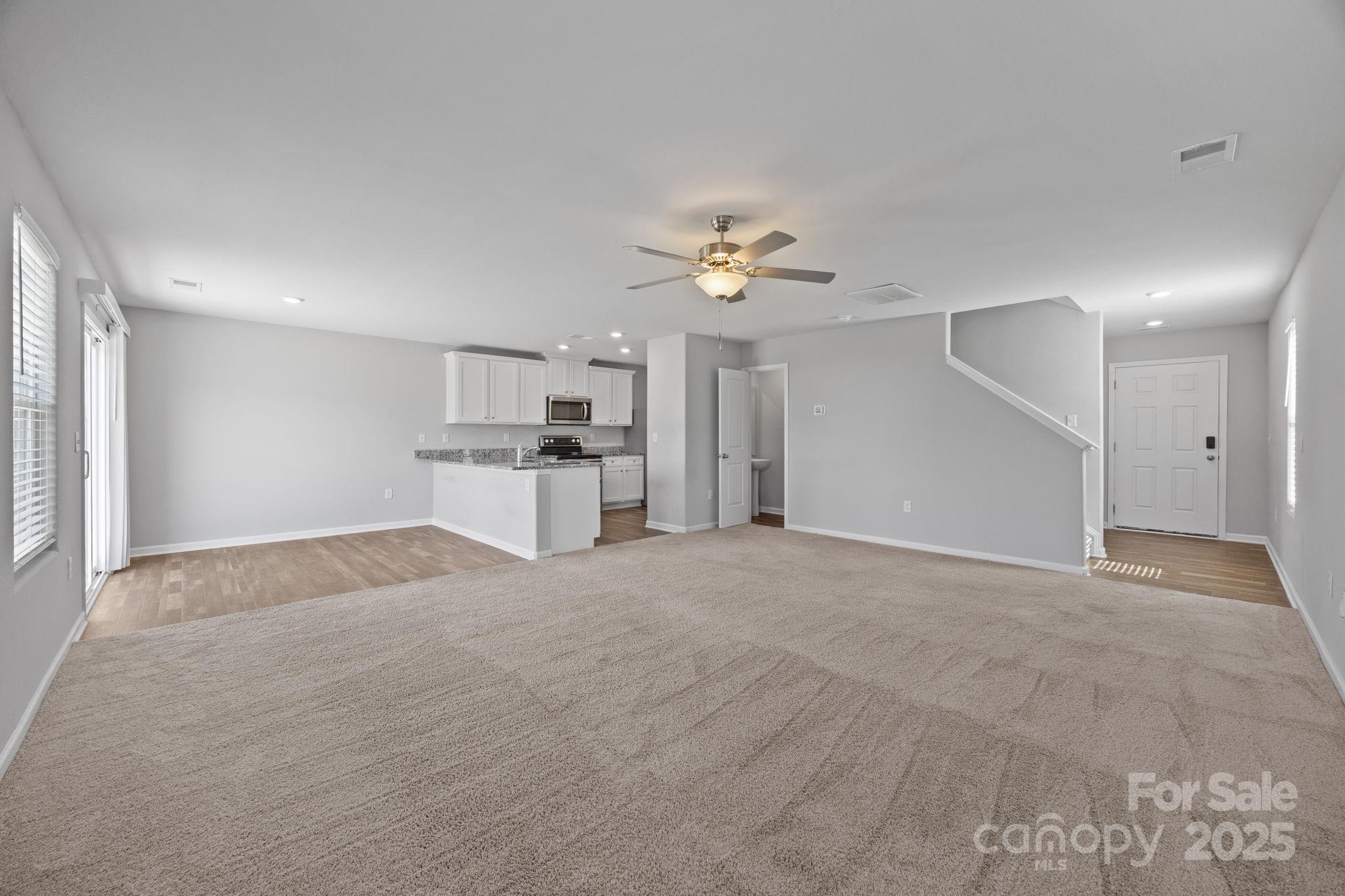 163 Kipling Lane Kings Mountain, NC 28086 - Photo 16 of 46 a view of a kitchen with a sink and a refrigerator