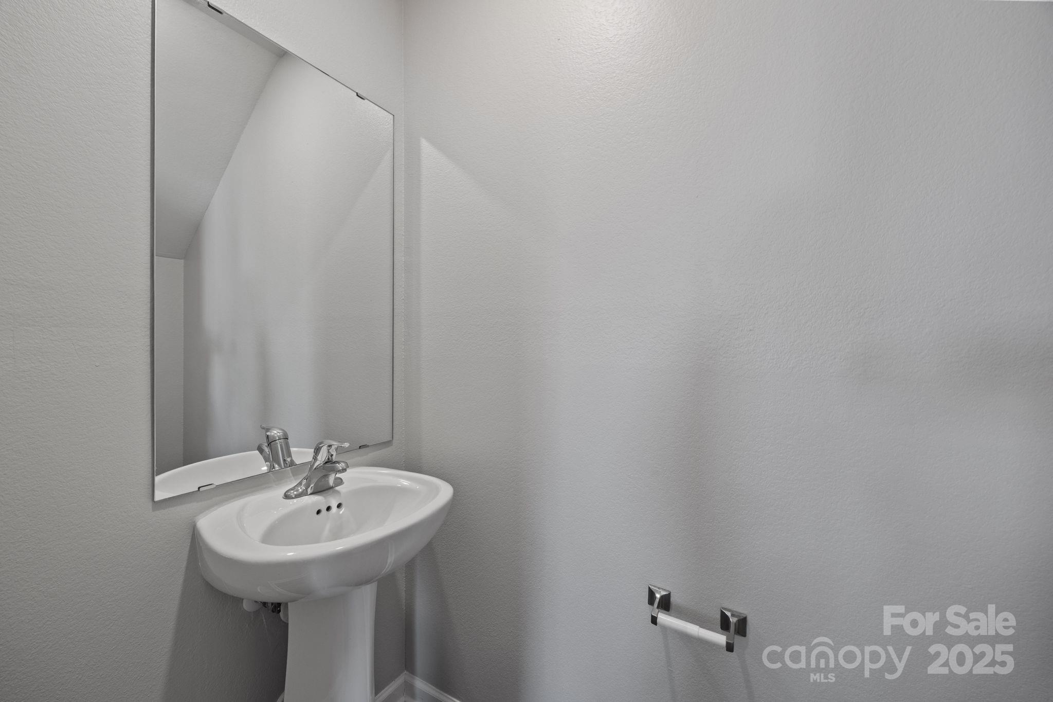 163 Kipling Lane Kings Mountain, NC 28086 - Photo 18 of 46 a bathroom with a sink and mirror
