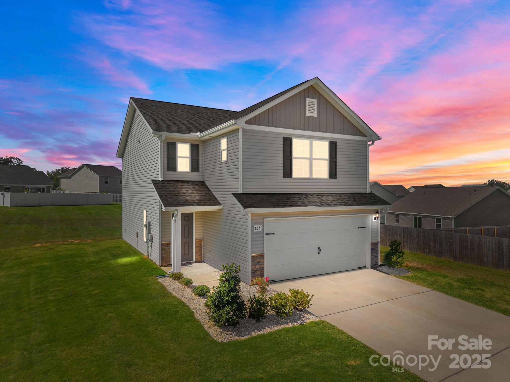 163 Kipling Lane Kings Mountain, NC 28086 - Photo 2 of 46 a front view of a house with garden