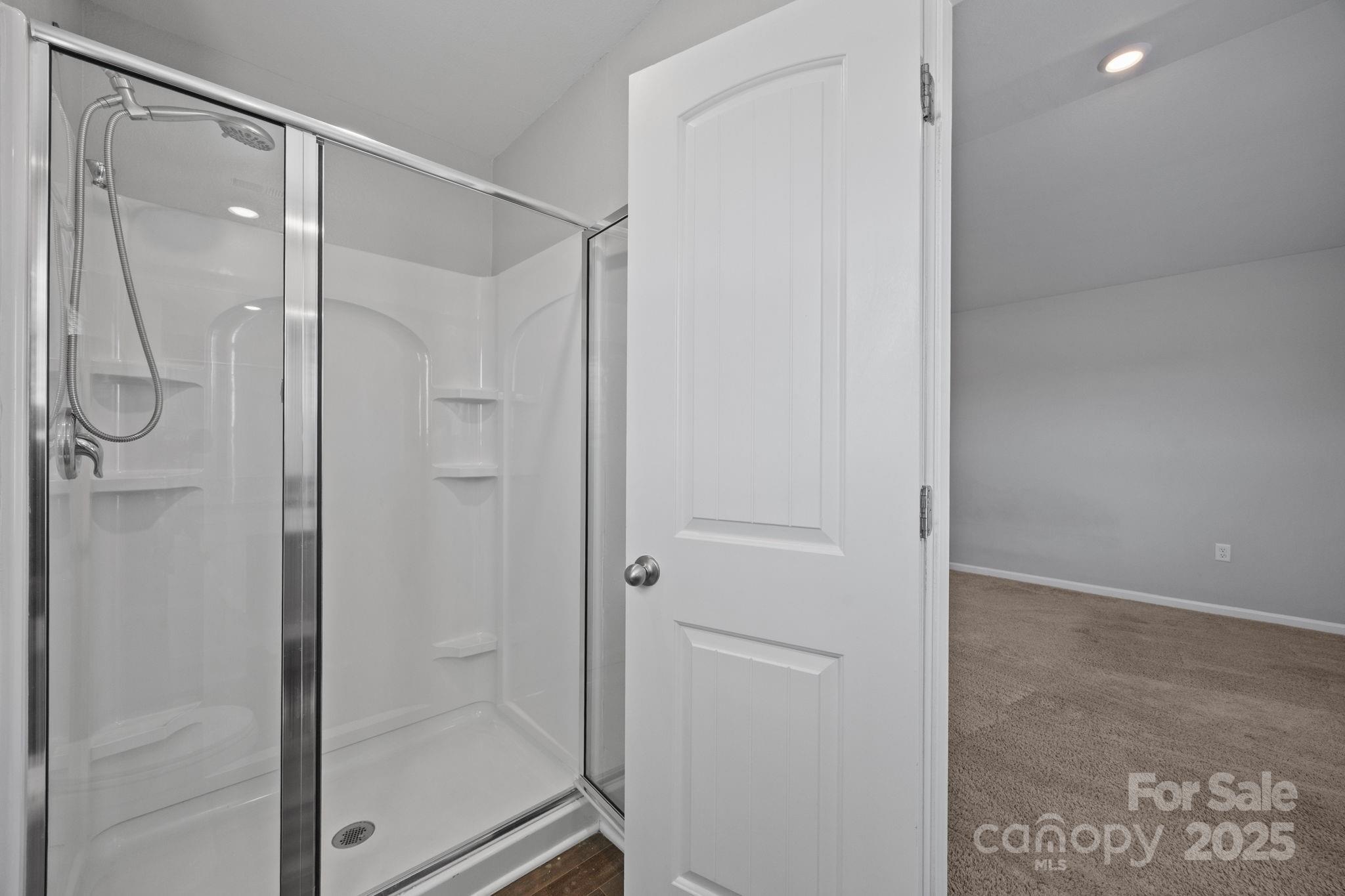 163 Kipling Lane Kings Mountain, NC 28086 - Photo 23 of 46 a bathroom with a glass shower door