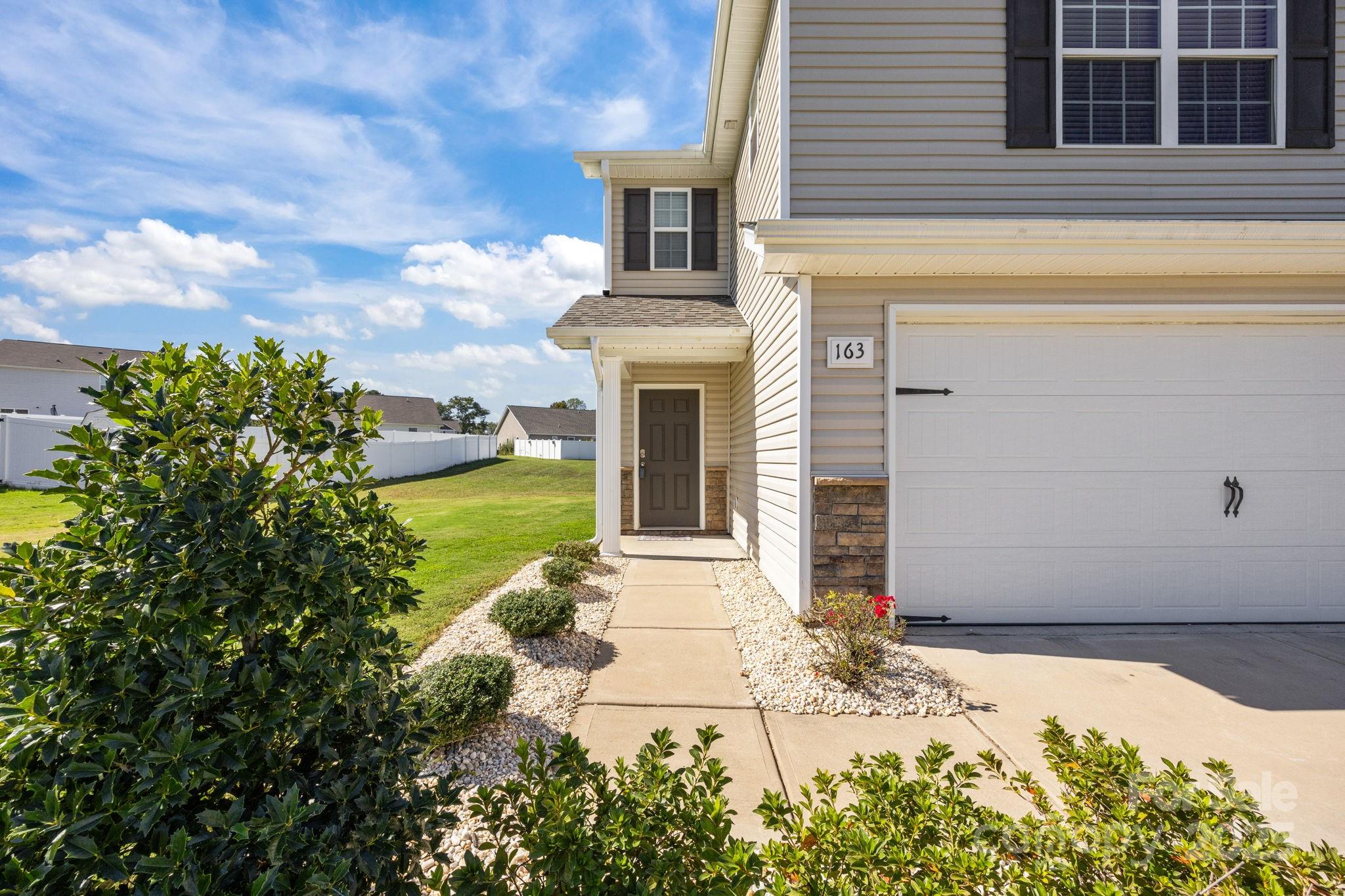 163 Kipling Lane Kings Mountain, NC 28086 - Photo 46 of 46 a front view of a house with garden