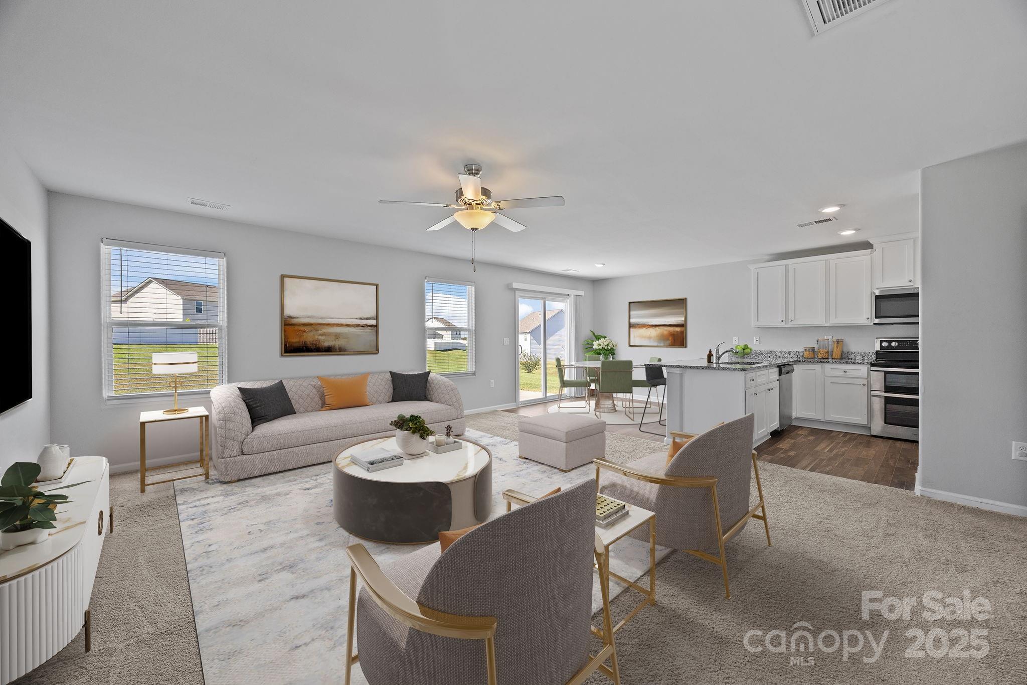 163 Kipling Lane Kings Mountain, NC 28086 - Photo 6 of 46 a view of a dining room with furniture and chandelier