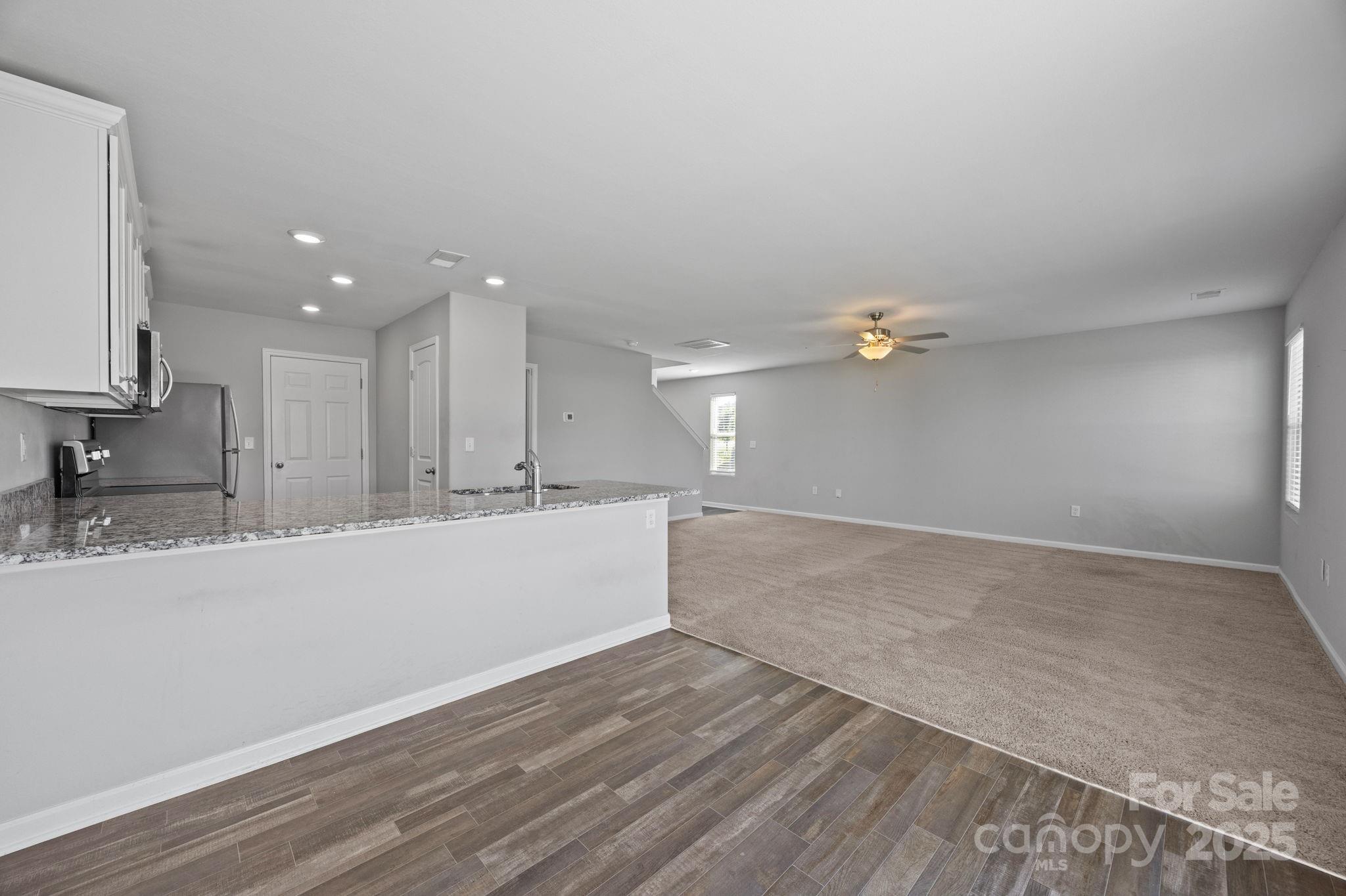 163 Kipling Lane Kings Mountain, NC 28086 - Photo 10 of 46 a view of a kitchen with wooden floor and a sink