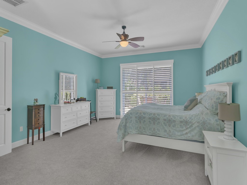 9220 Spring Time Drive Vero Beach, FL 32963 - Photo 11 of 28 a living room with furniture and a chandelier
