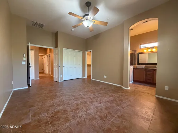 a view of a livingroom with a kitchen