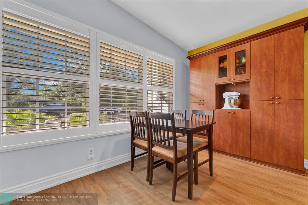 5751 Pine Terrace Plantation, FL 33317 - Photo 16 of 35 a dining room with furniture and windows
