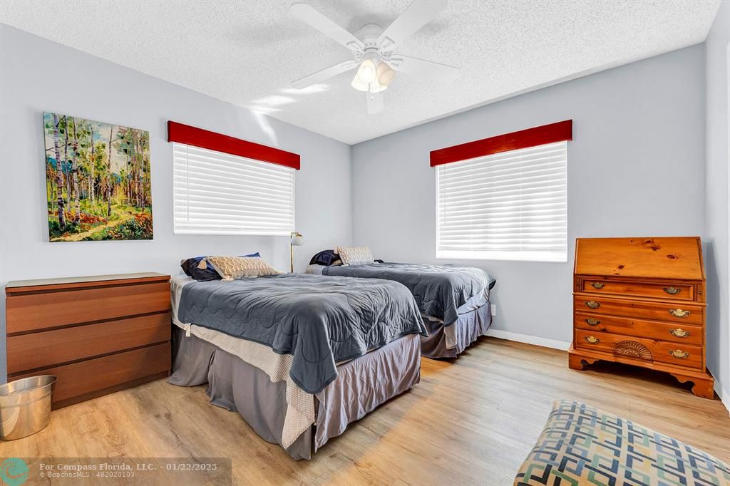 5751 Pine Terrace Plantation, FL 33317 - Photo 26 of 35 a bedroom with a bed and a dresser