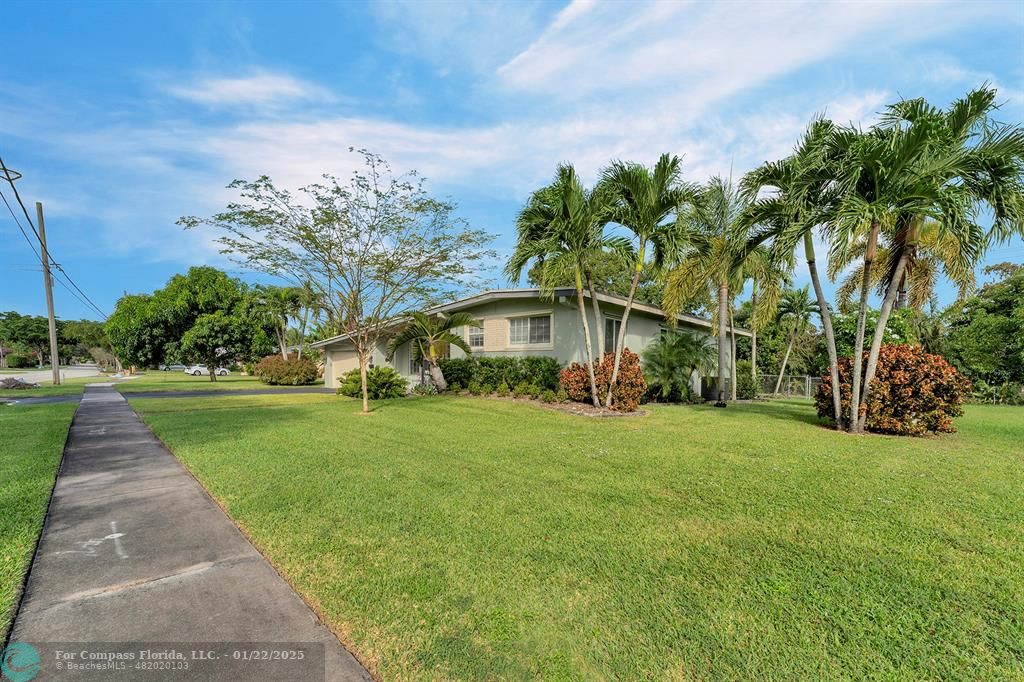 5751 Pine Terrace Plantation, FL 33317 - Photo 6 of 35 a front view of a house with garden