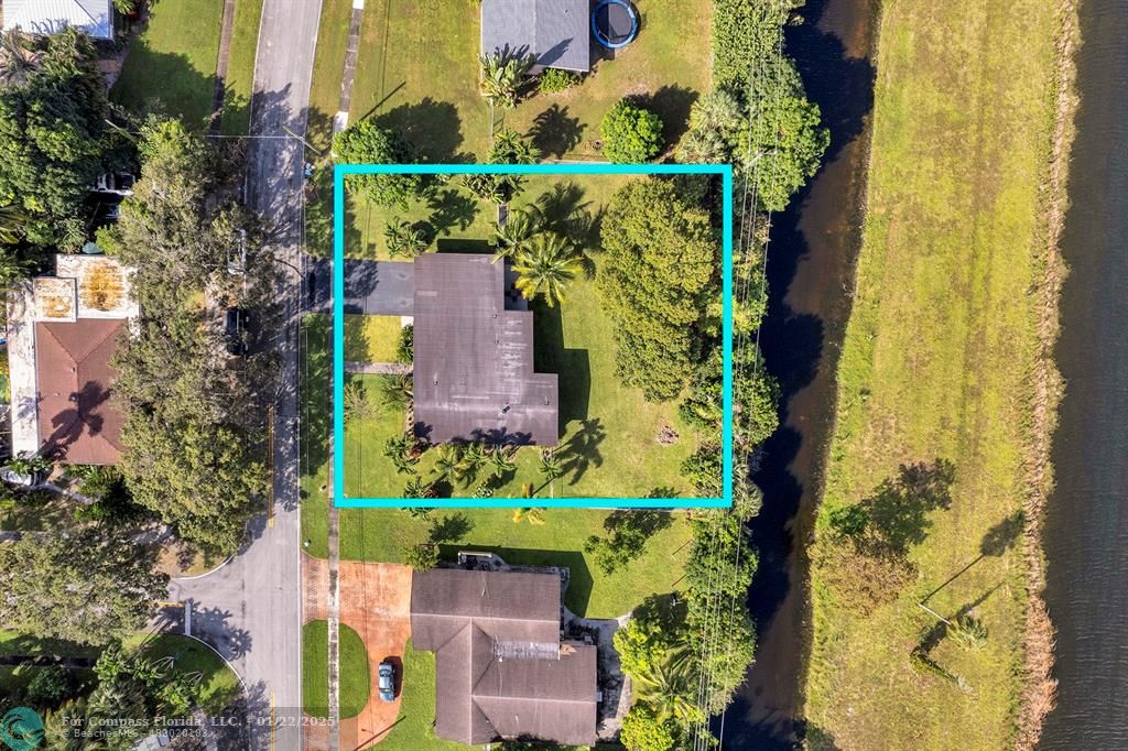 5751 Pine Terrace Plantation, FL 33317 - Photo 7 of 35 an aerial view of a house with a yard