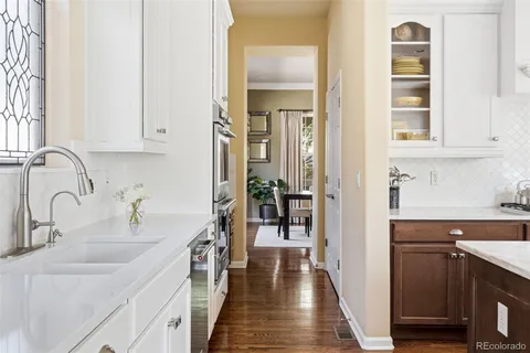 a kitchen with a sink and cabinets