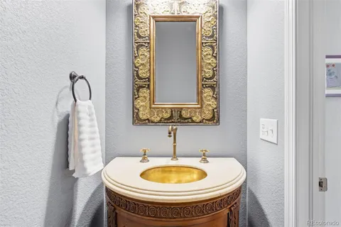 a bathroom with a toilet and a sink
