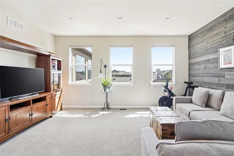 a view of a workspace with furniture