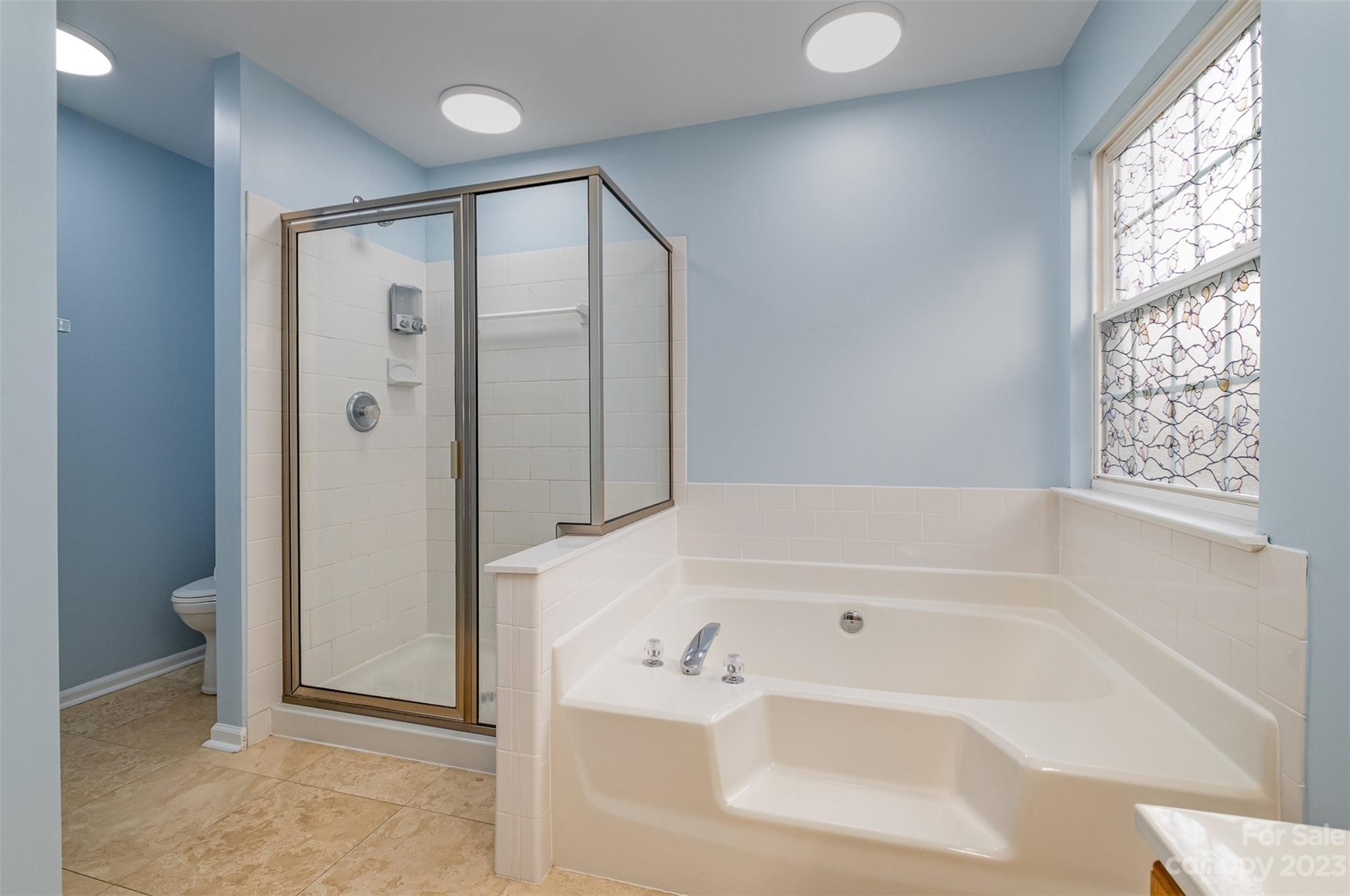 765 Knightswood Road Fort Mill, SC 29708 - Photo 24 of 41 a bathroom with a bathtub and a shower