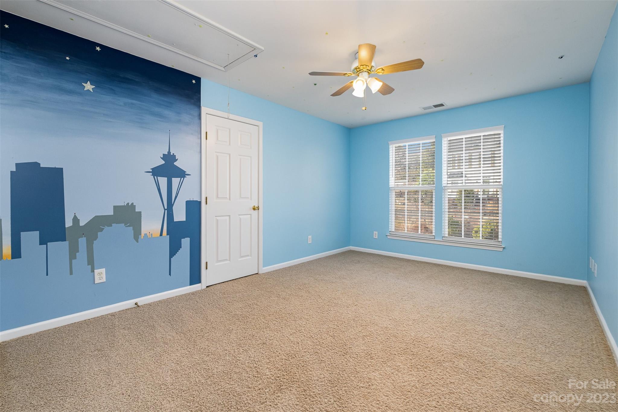 765 Knightswood Road Fort Mill, SC 29708 - Photo 27 of 41 a view of a livingroom with a ceiling fan and window