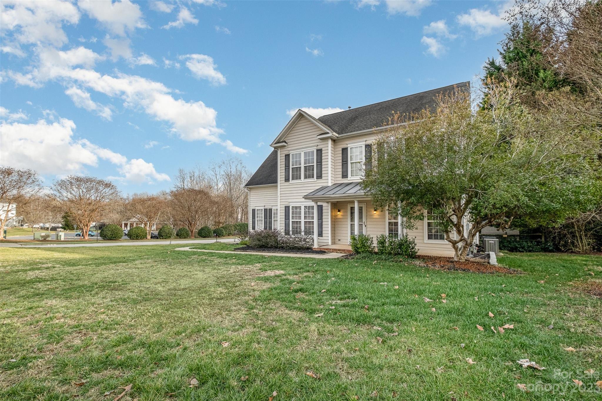 765 Knightswood Road Fort Mill, SC 29708 - Photo 3 of 41 a front view of a house with a yard