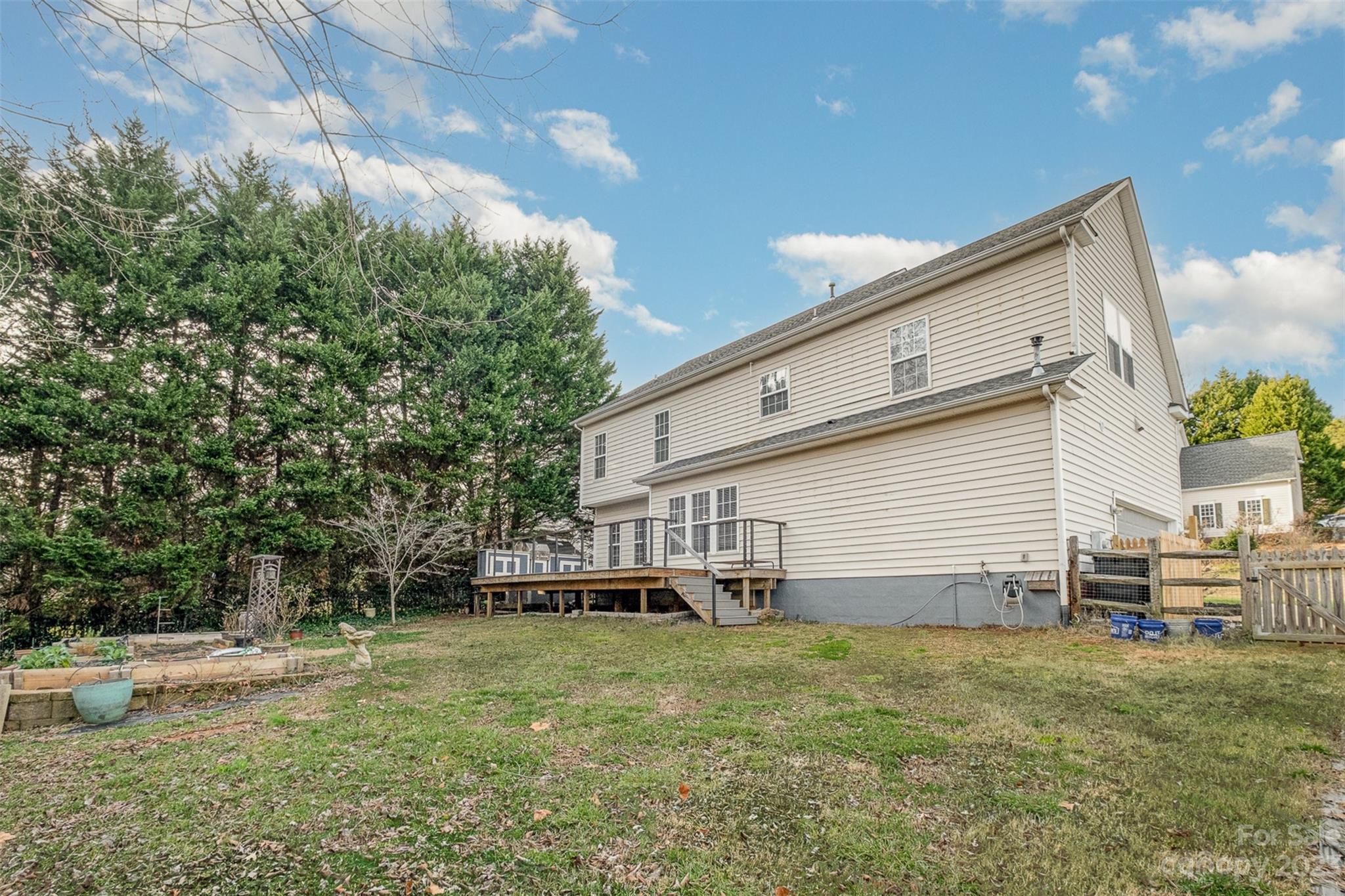 765 Knightswood Road Fort Mill, SC 29708 - Photo 35 of 41 a view of a house with a backyard