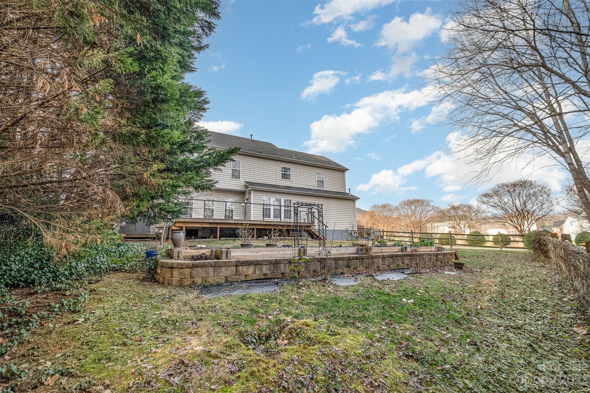765 Knightswood Road Fort Mill, SC 29708 - Photo 36 of 41 a view of a tall building with large trees