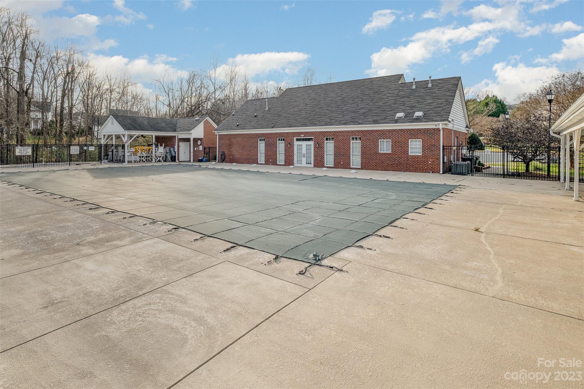 765 Knightswood Road Fort Mill, SC 29708 - Photo 40 of 41 a view of a brick house next to a yard