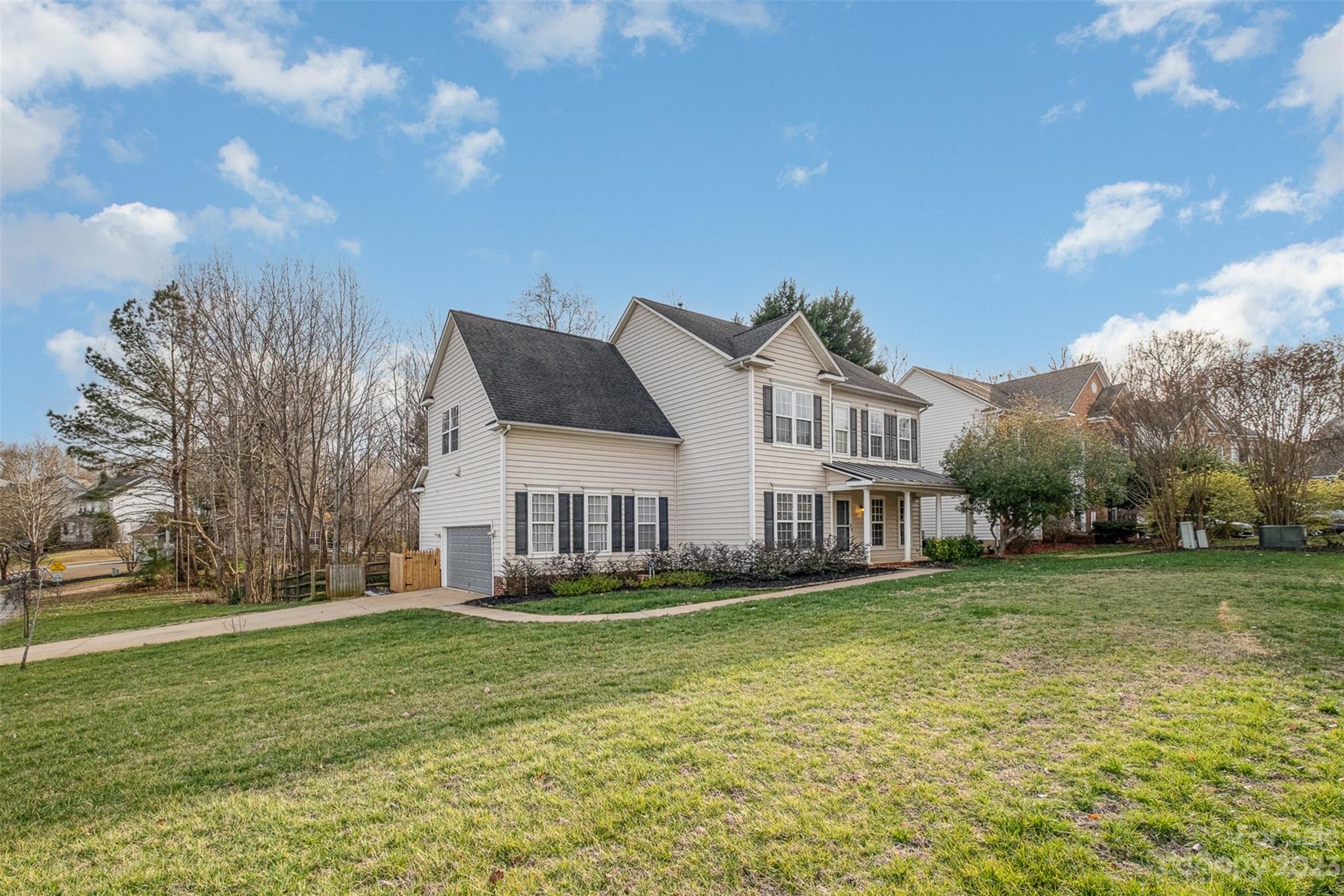 765 Knightswood Road Fort Mill, SC 29708 - Photo 4 of 41 a front view of house with yard
