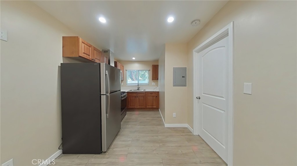 16609 Simonds Street Granada Hills, CA 91344 - Photo 3 of 7 a view of a kitchen from the hallway