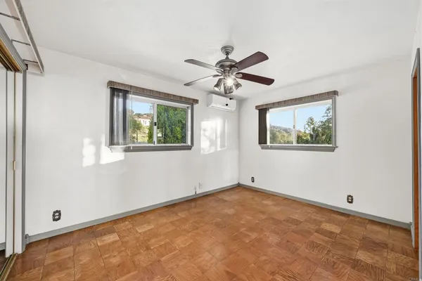 a view of balcony with furniture